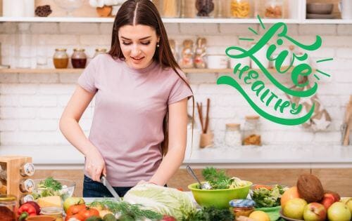 Woman preparing fresh fennel and vegetables