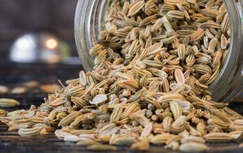 Overturned jar of fennel seeds